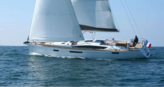A Jeanneau 57 sailing yacht under full sail
